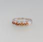 Preview: Ring mit orangefarbenen Steinen