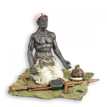 Bronze Skulptur orientalischer Waffenhändler sitzend
