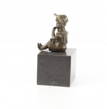 Bronze Skulptur kleines Mädchen sitzend