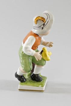 Junge mit Küken