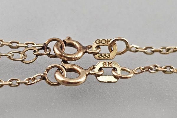 Gold-Garnitur Armband Ohrstecker Collier