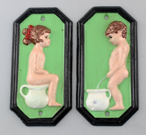Toiletten Schild Junge u. Mädchen grün